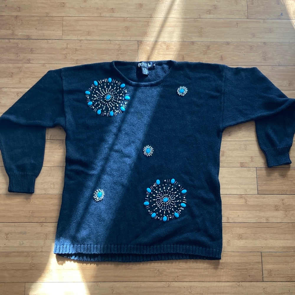 Chic Black Sweater with Blue Embellishments